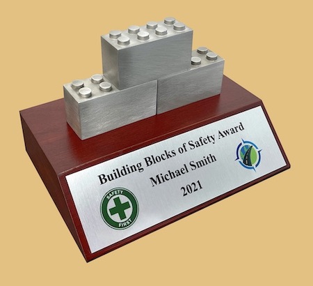 Building blocks of safety award trophy deal toy plaque on wood base with custom engraving
