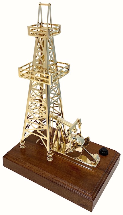 Gold plated oil well pump with derrick battery powered